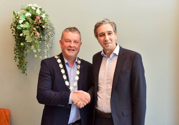 Cathaoirleach of Roscommon County Council, Cllr Paschal Fitzmaurice welcomes Taoiseach Simon Harris to Lough Key Forest Park for the Night &amp; Day Festival. Pic. Enda Regan