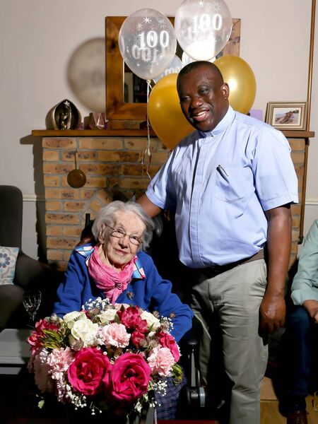 Bridget (B.T.) Naughton, Ballinvoher, Frenchpark who celebrated her 100th birthday recently pictured with Fr. Larry Ebuk. 