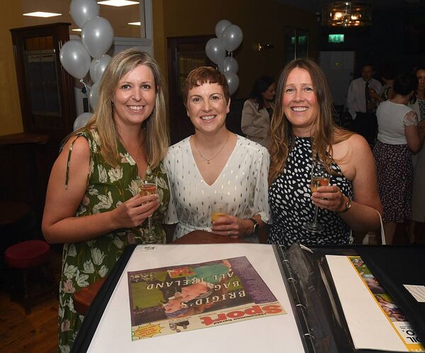 Catherine Kilcommons, Mary Beades and Síle Morrissey celebrating St. Brigid’s intermediate ladies’ football victory from 20 years’ ago, at a get-together in St. Brigid’s clubhouse. Pic. Gerard O’Loughlin