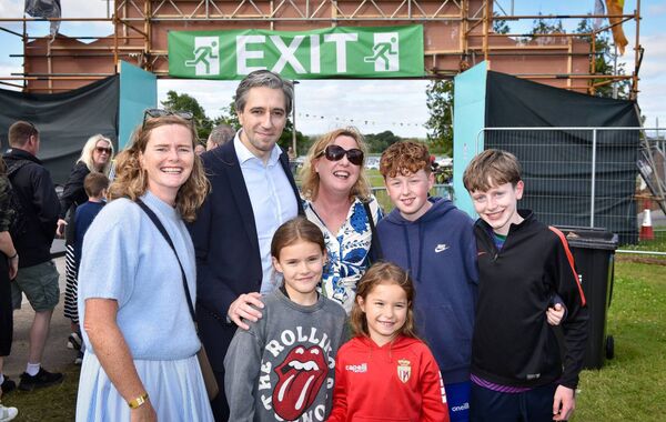 Maria Farrell, Wilma Farrell, Romy Herranz Farrell, Alma Herranz Farrell, Noah Guckian and Frankie Beirne get a picture with Taoiseach Simon Harris at the Night &amp; Day Festival at Lough Key Forest Park. Pic. Enda Regan 