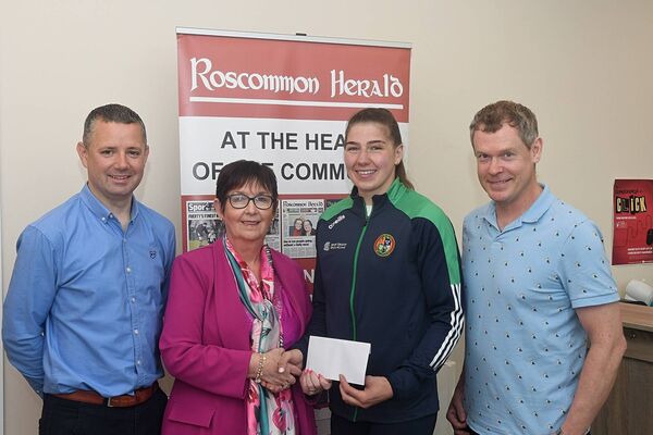 Claire Morgan, Sales Manager, Roscommon Herald, makes a presentation to Aoife O'Rourke ahead of her second Olympic Games in Paris this week. Also pictured are Alan Beirne, Deputy Sales Manager, and Ian Cooney, Sports Editor, Roscommon Herald. Picture: Gerard O'Loughlin Claire Morgan, Sales Manager, Roscommon Herald, makes a presentation to Aoife O'Rourke ahead of her second Olympic Games in Paris this week. Also pictured are Alan Beirne, Deputy Sales Manager, and Ian Cooney, Sports Editor, Roscommon Herald. Picture: Gerard O'Loughlin