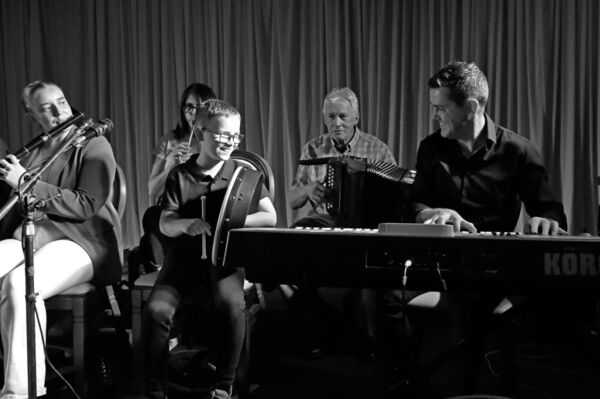 Joe Mattimoe pictured having fun performing with the Chairman of the O'Carolan Harp Festival and Summer School committee Declan Noone. Picture: David Knight