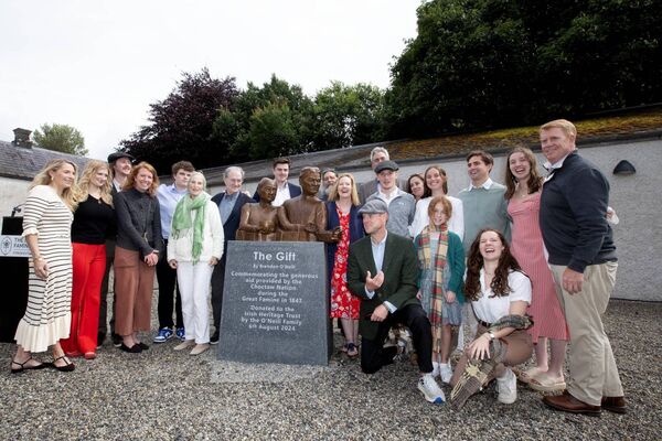 Sculptor Brendan O'Neill and his wife Susan pictured after the unveiling with their children, grandchildren and extended family who travelled from the USA for the unveiling. Pic. Brian Farrell Sculptor Brendan O'Neill and his wife Susan pictured after the unveiling with their children, grandchildren and extended family who travelled from the USA for the unveiling. Pic. Brian Farrell