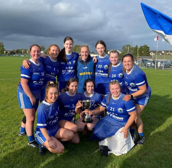 St. Croan's players celebrate with Richael Timothy's following the club's LGFA Junior A championship success in 2022 against Michael Glaveys in Ballyleague. Richael was a selector with the team. 