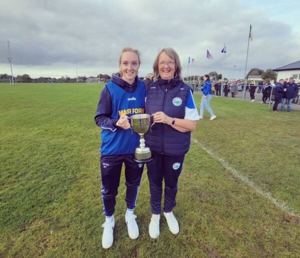 Richael Timothy with her mother Rosaleen after St. Croan's won the 2022 intermediate ladies' football championship. 