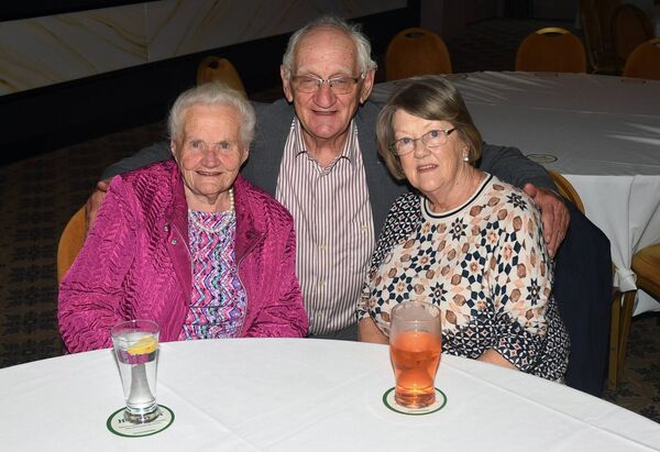 Kay Egan and Sheila Lennon, pictured with Fr. Michael Hickey at a party in his honour in the Shamrock Lodge Hotel, Athlone.