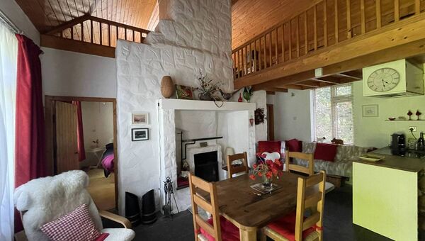 The cosy living room/dining room space.