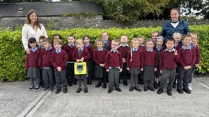 Road contractors present defibrillator to County Roscommon school