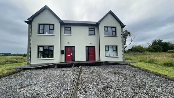 The two semi-detached three bedroomed houses set on a 0.98 former development site in Ballinagare.
