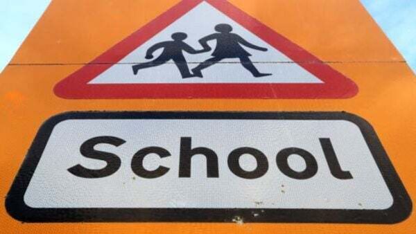 Man arrested on suspicion of indecent exposure outside school