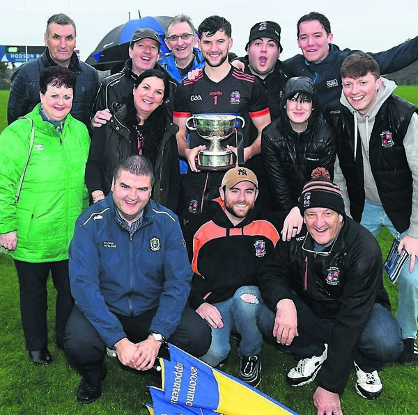 Aaron Brady with family and friends celebrating with the Jamesie Murray Cup. Pic: Ger O'Loughlin