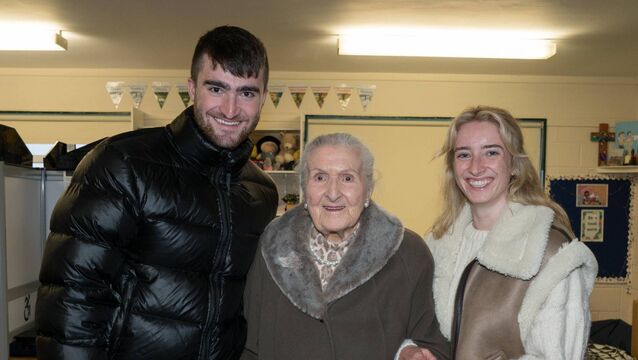 <p>Breegeen Monaghan from Carrick-on-Shannon was surprised when two of her grandchildren, Rory and Clíodhna King, flew in from Australia to celebrate her 100th birthday on polling day. Pic: Gerry Faughnan</p>