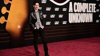 Timothee Chalamet channels Bob Dylan at premiere of A Complete Unknown