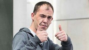 Man accused of harassment put shotgun cartridge in ex's hand saying 'you're next', court hears