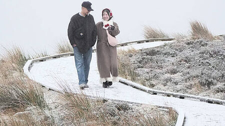 Weather warnings remain in place as authorities clear snow, 28,000 without power