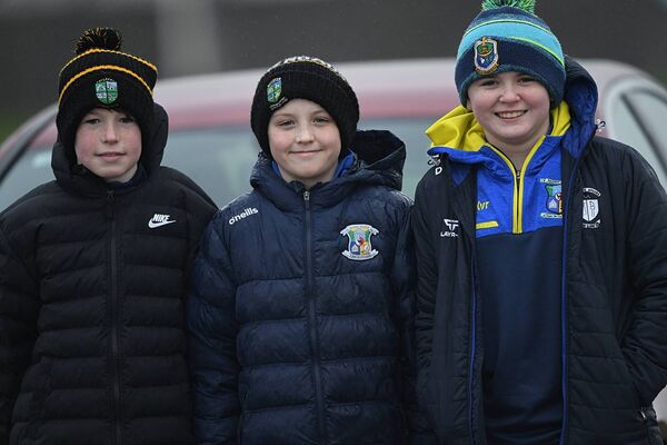 Thomas Kelly, Donnacha Finneran and David Thompson supporting the Roscommon senior footballers against Down at King and Moffatt Dr. Hyde Park on Sunday last. 