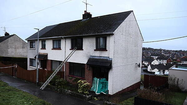 Man arrested on suspicion of arson after four people rescued from burning house