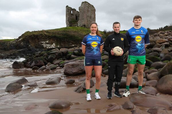 Kerry and Na Gaeil midfielders Mary O'Connell and Diarmuid O'Connor with Comórtas Chairperson, Padraig Ó Sé (centre) at Minard Castle, Lispole in West Kerry announcing details of the Lidl Comórtas Peile Páidí Ó Sé 2025.