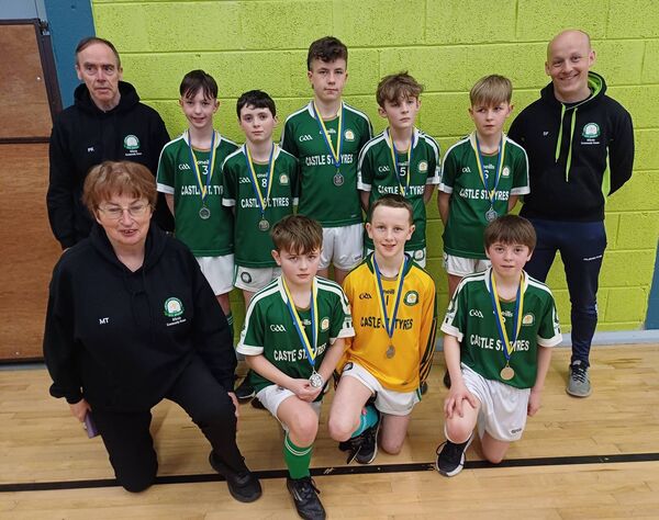 The U-13 boys' team from Kilbride alongside their management of Paul Kelleher and Stuart Feely that won silver medals at the Community Games indoor soccer competition in Strokestown. Also pictured is Secretary Margaret Tracey.