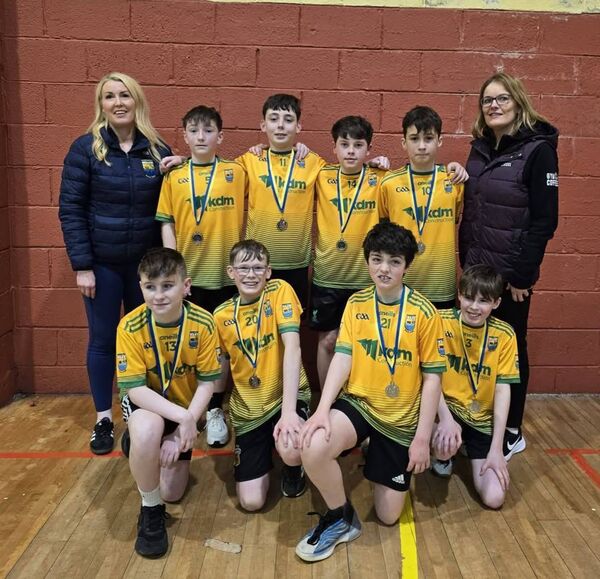 The U-13 boys' basketball team from Croghan/Drumlion/Cortober, and their management, that won silver medals at the Community Games finals in Castlerea.