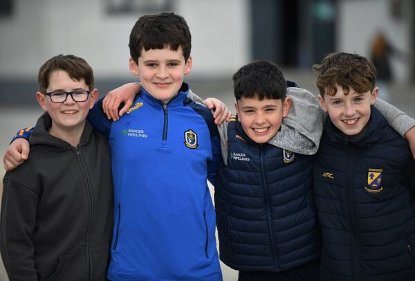 WE ARE ROS': Senan Shannon, Jason Sutton, Cian Healy and Ryan Clogher supporting the Rossies against Cavan at King and Moffatt Dr. Hyde Park on Sunday last. Picture: Gerard O'Loughlin