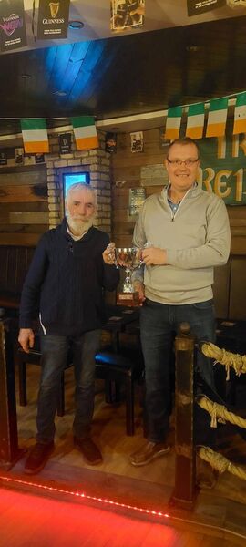 Committee member Lorcan Egan presenting the cup for 'Best Vintage Vehicle' at the Boyle St. Patrick’s Day Parade to Joe Sweeney.