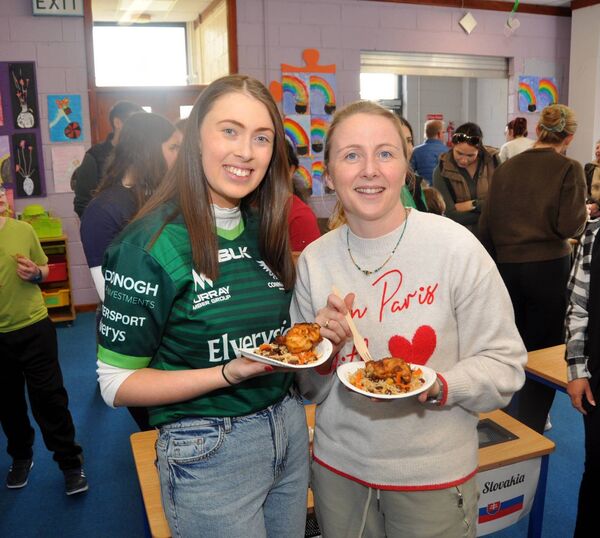 Principal Jacinta Ni Chonghaile and teacher Tara Muldowney tasting the food at a multi-cultural day at St. Anne’s NS, Castlerea on Friday last. Pic: Liam Reynolds