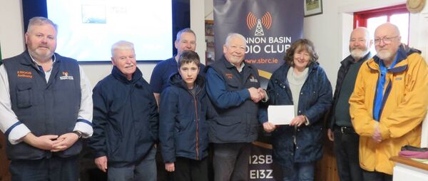 Shannon Basin Radio Club presents Elphin Windmill Committee member Rosie Nee with a generous cheque towards repairs to the windmill. Pictured are: Anthony Dolan, Sean Martin, Conor Nolan, Keith Nolan, Chairman Pat O'Connor, Rosie Nee, Barry Beirne, Windmill committee and Fergus Millar. 