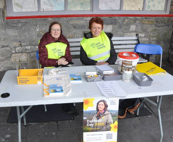Hannah O'Connor and Eileen Mulvihill helping out on Daffodil Day in Castlerea on Friday last in aid of the Irish Cancer Society. Pic: Liam Reynolds