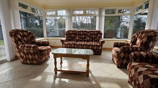 Off the kitchen is a wonderful south facing sun room with three glass walls. Off the kitchen is a wonderful south facing sun room with three glass walls.