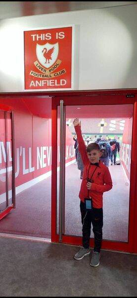 Harry Fleming pictured at Anfield. The 10 year old from Castlerea will walk out with the Liverpool team when they play Brighton &amp; Hove Albion next month.