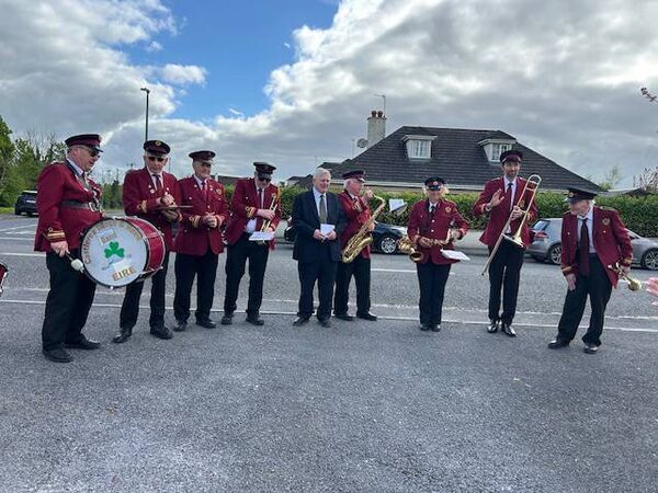 Mr Kevin Satchwell, Knockroe, Castlerea on the occasion of his 90th birthday pictured with members of the Castlerea Bras and Reed Band who turned out for the special celebrations.