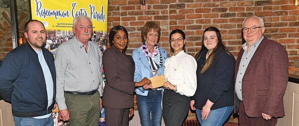 Picture shows Patricia Mullaney, treasurer Roscommon Easter Parade Committee, presenting a runners-up cheque to Olabisi Ogunsakin and Isabella Putric of the Zion Family Christian Church, at a Roscommpn Easter Parade presentation night in the Red Parrot Bar, Roscommon. Also in picture, from left: Mark Molloy asst. treasurer; J.J. Cattigan, secretary; Niamh Cattigan, committee member and Cllr. Larry Brennan, chairperson Roscommon Easter Parade Committee. Pic: Gerard O’Loughlin