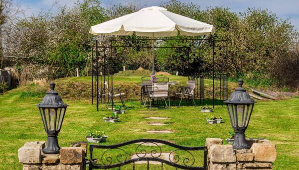 A serene outdoor space is the perfect spot to unwind.