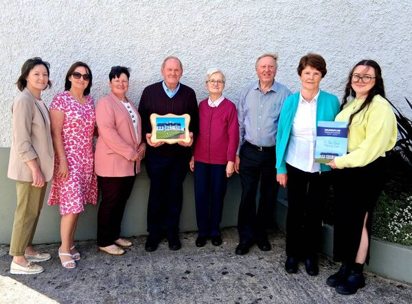 
                        Aidan Malone holds a beautiful clock presented to him marking 50 years on the Board of Management of Drumboylan National School and his commitment to the school. Pictured: Angela Dowd, Bernie Lavin, Geraldine Guckian, Aidan Malone, Chris Malone, Gabriel Malone, Breege Malone, and Aoife Guckian. Pic: Noreen Gaffney
                    