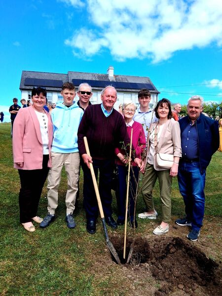 
                        Aidan Malone pictured with family members as he plants a tree on the grounds of Drumboylan National School, marking his 50 years on the Board of Management of the school. Pictured shows Geraldine Guckian, Brion Dowd, Kevin Guckian, Aidan Malone, Chris Malone, Ronan Guckian, Angela and Anthony Dowd. Pic: Noreen Gaffney 