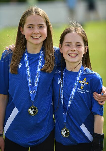 Members of the successful St. John's Athletic U-12 girls' squad, Sibeal Ní Mhainnin and Grace Keaveney, in Lecarrow on Sunday last. Picture: Gerard O'Loughlin Members of the successful St. John's Athletic U-12 girls' squad, Sibeal Ní Mhainnin and Grace Keaveney, in Lecarrow on Sunday last. Picture: Gerard O'Loughlin
