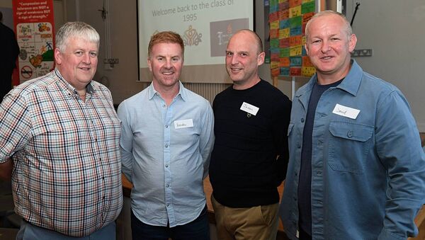 Principal of Roscommon CBS Kevin Scollan, pictured at a 1995 class reunion with former pupils Brendan McDonagh, Jason Hannon and David Connolly, Roscommon Town. Pic: Gerard O’Loughlin