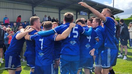 Five-star St. John’s secure historic league and cup double