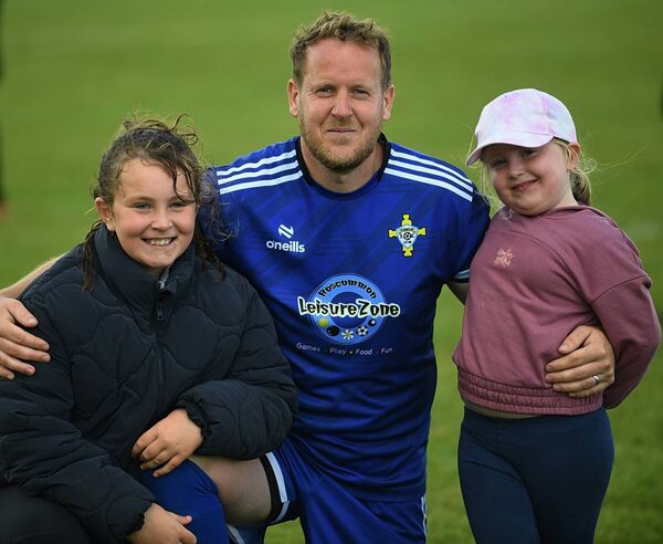 Caoimhe and Ealadh Duffy pictured with their father and St. John's Athletic midfielder, Alan Duffy, following the Lecarrow-based side's historic double on Sunday. Caoimhe and Ealadh Duffy pictured with their father and St. John's Athletic midfielder, Alan Duffy, following the Lecarrow-based side's historic double on Sunday.