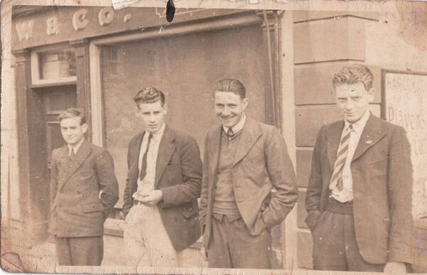Kevin Connaughton (second from left)with some friends outside Harlow and Co. in Main St. Roscommon Town before he went to England.