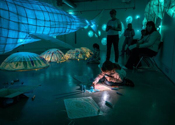Chloe Kedian colouring by phone light at the Basking workshop with Tom Meskall as part of the Cruinniú na nÓg celebrations last weekend at Roscommon Arts Centre. Pic: Cian Flynn  