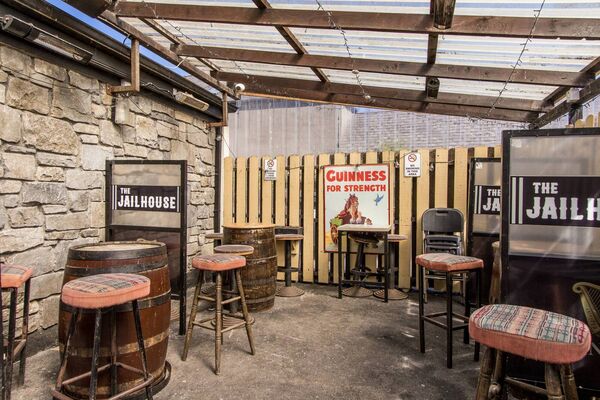 The property has a covered outdoor seating area. The property has a covered outdoor seating area.