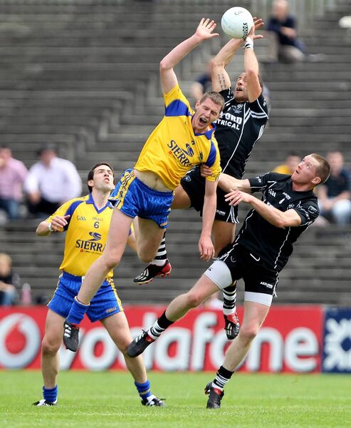 RISING HIGH: Former Roscommon midfielder and current Roscommon Herald columnist, Michael Finneran, challenging Sligo duo, Eamonn O'Hara and Tony Taylor, for possession during the 2010 Connacht senior football final at MacHale Park, Castlebar. Picture: INPHO/James Crombie RISING HIGH: Former Roscommon midfielder and current Roscommon Herald columnist, Michael Finneran, challenging Sligo duo, Eamonn O'Hara and Tony Taylor, for possession during the 2010 Connacht senior football final at MacHale Park, Castlebar. Picture: INPHO/James Crombie