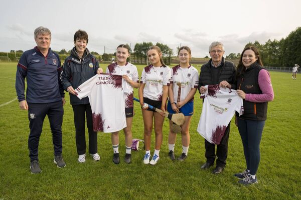 Kieran Moylan (Tulsk Camogie Club chairperson and coach), Karina Jones (vice-chairperson and coach), some of the Tulsk Camogie minor team, Seamus Conway (Community Fit Giveaway winner) and  Mary Nohilly (client relationship manager at Community Finance Ireland) at the presentation in Tulsk. Pic: Andrew Downes, xposure
