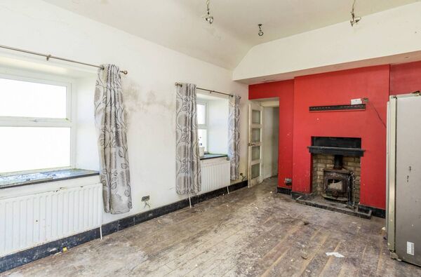 The property offers a blank canvas for those eager to restore and reimagine a home of character. 