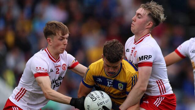 <p> Tyrone's Elliott Kerr and Pádraig Goodman tackle Roscommon's Luke Shally during Sunday afternoon's All-Ireland minor football championship semi-final at Kingspan Breffni on Sunday afternoon. Picture: INPHO/Leah Scholes</p>