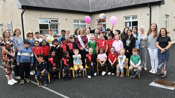 Pupils, teachers and staff at Kilteevan NS, pictured at the retirement of school principal Colette Brennan on her last day at the school. Pic: Gerard O’Loughlin