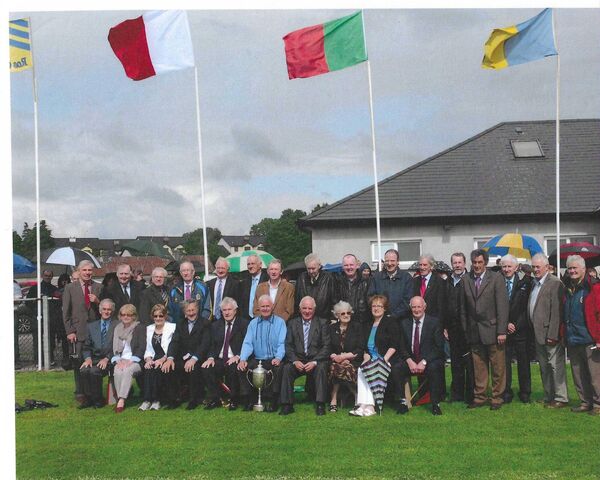 The St. Faithleach's senior football team of 1965, the club's sole senior championship winners, being honoured on the 50th anniversary of the club's founding in 2012. 