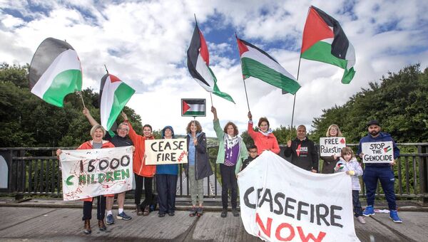 Members of the Boyle Palestine Solidarity Group taking part in their weekly Bridgil over the N4 in Boyle. Pic: Brian Farrell